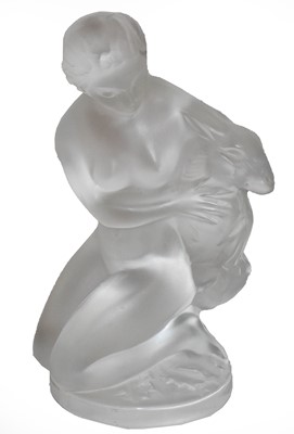 Lot 406 - A Lalique Glass Paperweight, modeled as a girl...