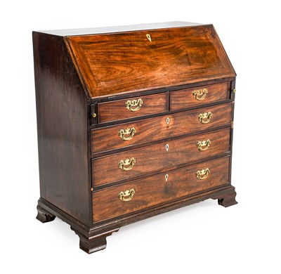 Lot 1241 - ^ A George III Mahogany and Oak-Lined Bureau,...