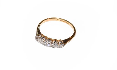 Lot 50 - A five stone diamond ring, stamped '18CT' and '...