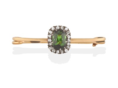 Lot 2400 - A Green Tourmaline and Diamond Cluster Brooch