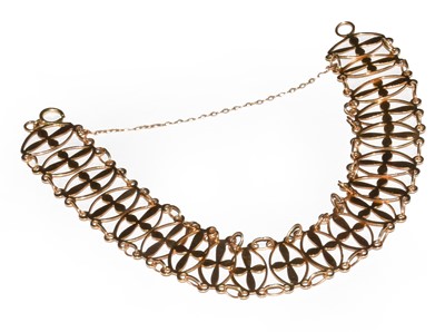 Lot 11 - A 9 carat gold curb link bracelet, length...