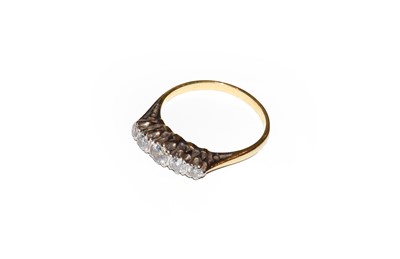 Lot 15 - An 18 carat gold diamond five stone ring,...