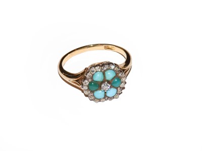 Lot 33 - A turquoise and diamond cluster ring, stamped '...