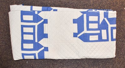 Lot 1057 - A modern navy and cream quilt with appliqued...