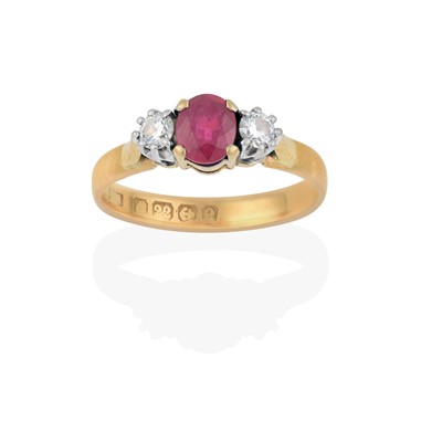 Lot 2300 - A 22 Carat Gold Ruby and Diamond Three Stone Ring