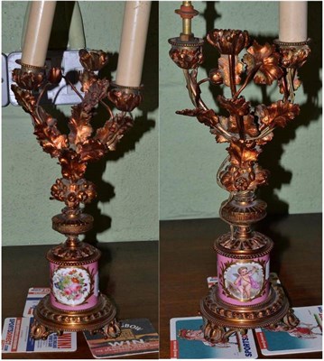 Lot 313 - A pair of 19th century lacquered brass three branch candelabra, with naturalistic model...