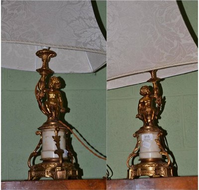 Lot 315 - Pair of French gilt metal and marble table lamps