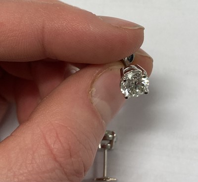 Lot 2415 - A Pair of Diamond Solitaire Earrings