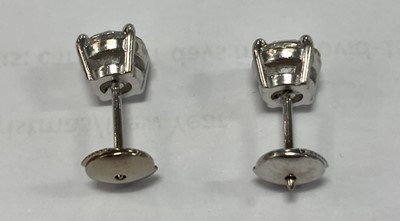 Lot 2415 - A Pair of Diamond Solitaire Earrings