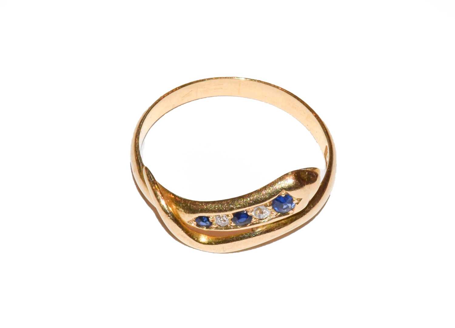 Lot 79 - An 18 carat gold sapphire and diamond snake...