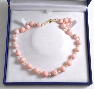 Lot 323 - Pink coral necklace with 9ct gold clasp