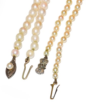 Lot 286 - Two graduated cultured pearl necklaces, length...