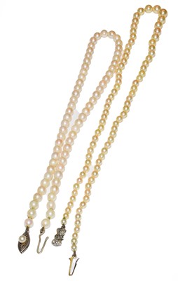 Lot 82 - Two graduated cultured pearl necklaces, length...