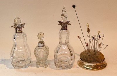 Lot 211 - Two silver collared decanters, silver hatpin...
