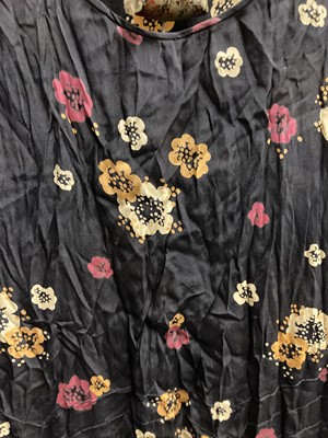 Lot 2043 - Circa 1920s Dresses, comprising a black floral...