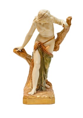 Lot 144 - A Royal Worcester blush ivory figure of a...