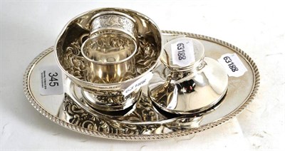 Lot 345 - A silver oval dish, inkwell, two napkin rings and a small footed dish