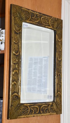 Lot 1370 - An Arts & Crafts brass bevel glass mirror