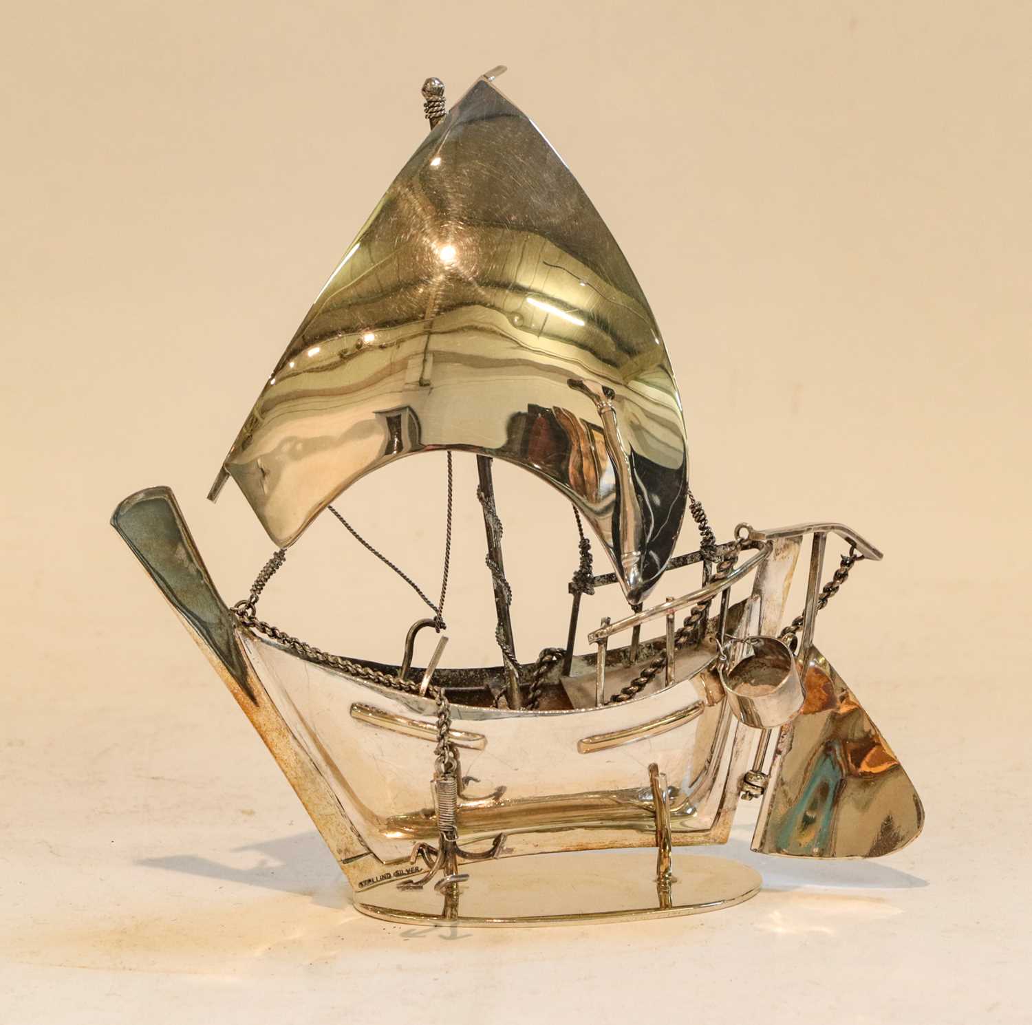 Lot 1027 - A Middle Eastern silver model of a Dhow,...