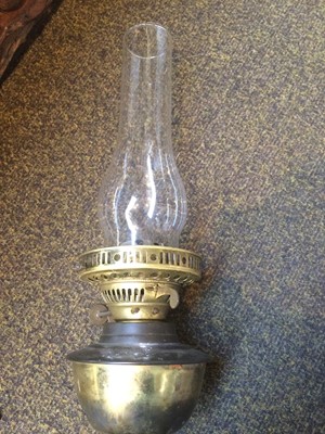 Lot 408 - Two brass oil lamps on brackets with chimneys...
