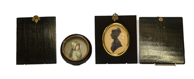 Lot 158 - A portrait miniature of a young girl, two...