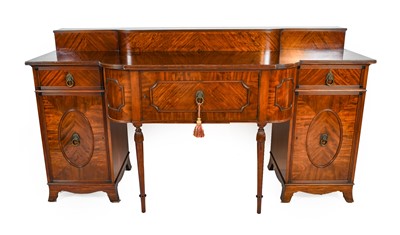 Lot 1294 - A Regency-Style Mahogany Bowfront Sideboard,...