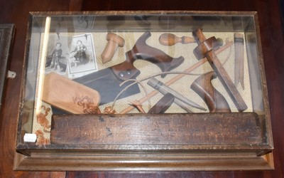Lot 476 - A framed wall display of various woodworking...
