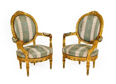 Lot 1344 - A Pair of Louis XVI Style Giltwood Fauteuils,...