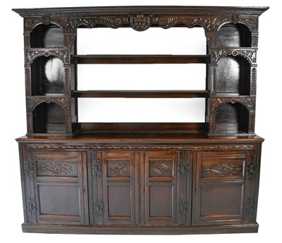 Lot 1357 - A Victorian Carved Oak Dresser and Rack, the...