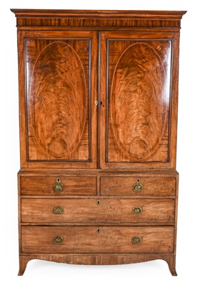 Lot 1261 - A George III Mahogany Linen Press, circa 1800,...