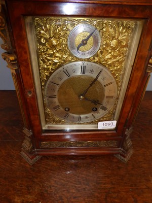 Lot 1093 - A Burr Walnut Quarter Striking Table Clock,...