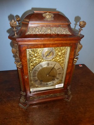 Lot 1093 - A Burr Walnut Quarter Striking Table Clock,...
