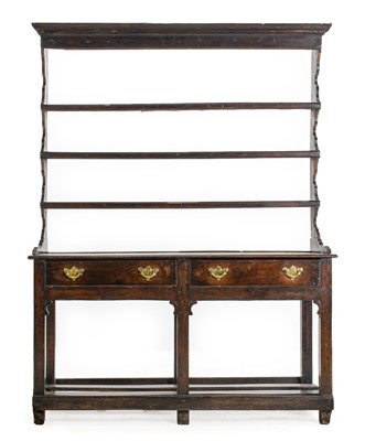 Lot 777 - A George III Oak Potboard Dresser and Rack,...