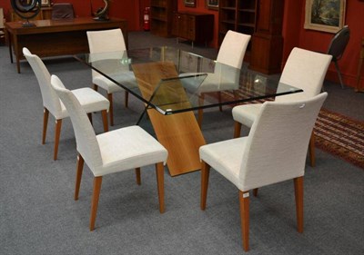 Lot 1003 - A Roche Bobois Theoreme Dining Table, the rectangular bevelled glass top, on a glass and walnut...