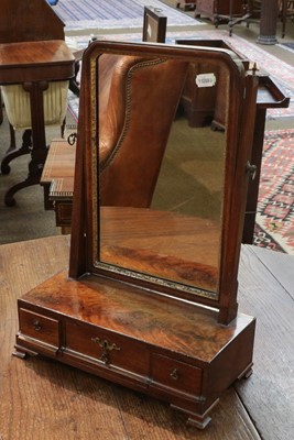 Lot 1296 - A George II walnut toilet mirror with three...