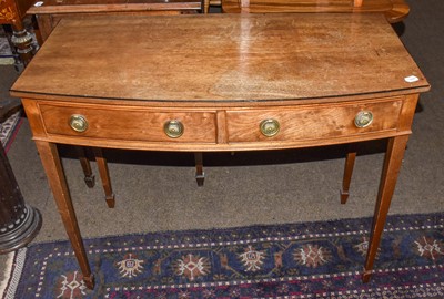 Lot 1271 - A reproduction mahogany sofa table, a bow...