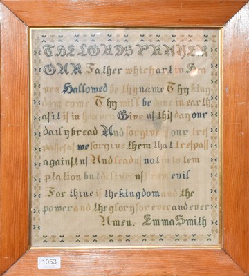 Lot 1053 - A framed woolwork sampler of two houses...