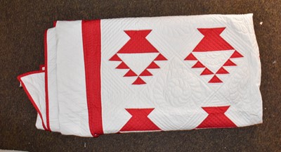 Lot 1058 - A modern red and white quilt appliqued with...