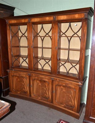 Lot 424 - Reproduction mahogany convex shaped bookcase