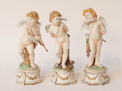 Lot 223 - Three 20th century Ginori cherubs on circular...