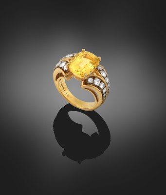 Lot 2089 - A Yellow Sapphire and Diamond Ring