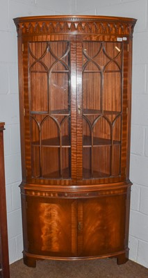 Lot 1260 - A reproduction mahogany corner cabinet, 86cm...