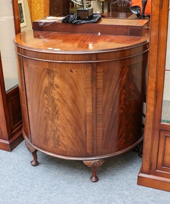 Lot 1373 - An early 20th century demilune mahogany...