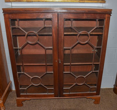 Lot 1261 - A late 19th century mahogany glazed bookcase...