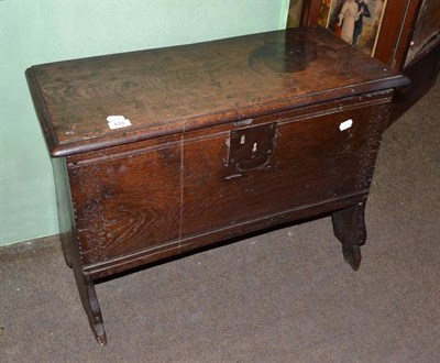 Lot 433 - A 17th century oak coffer of plank construction