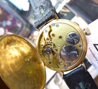 Lot 177 - An 18 carat gold enamel dial wristwatch,...