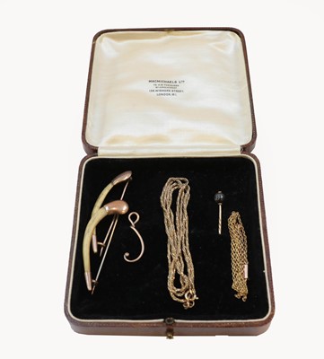 Lot 180 - A 9 carat gold bow brooch/pendant, length...