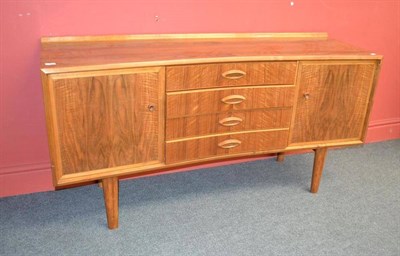 Lot 1006 - A Gordon Russell English Walnut Sideboard, designed by W.H. (Curly) Russell, circa 1956, with...