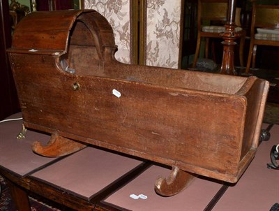 Lot 448 - An oak cradle