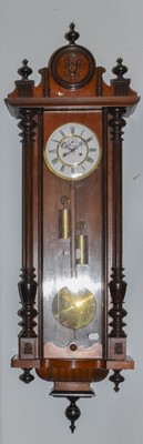 Lot 1360 - A Vienna type double weight driven wall clock,...